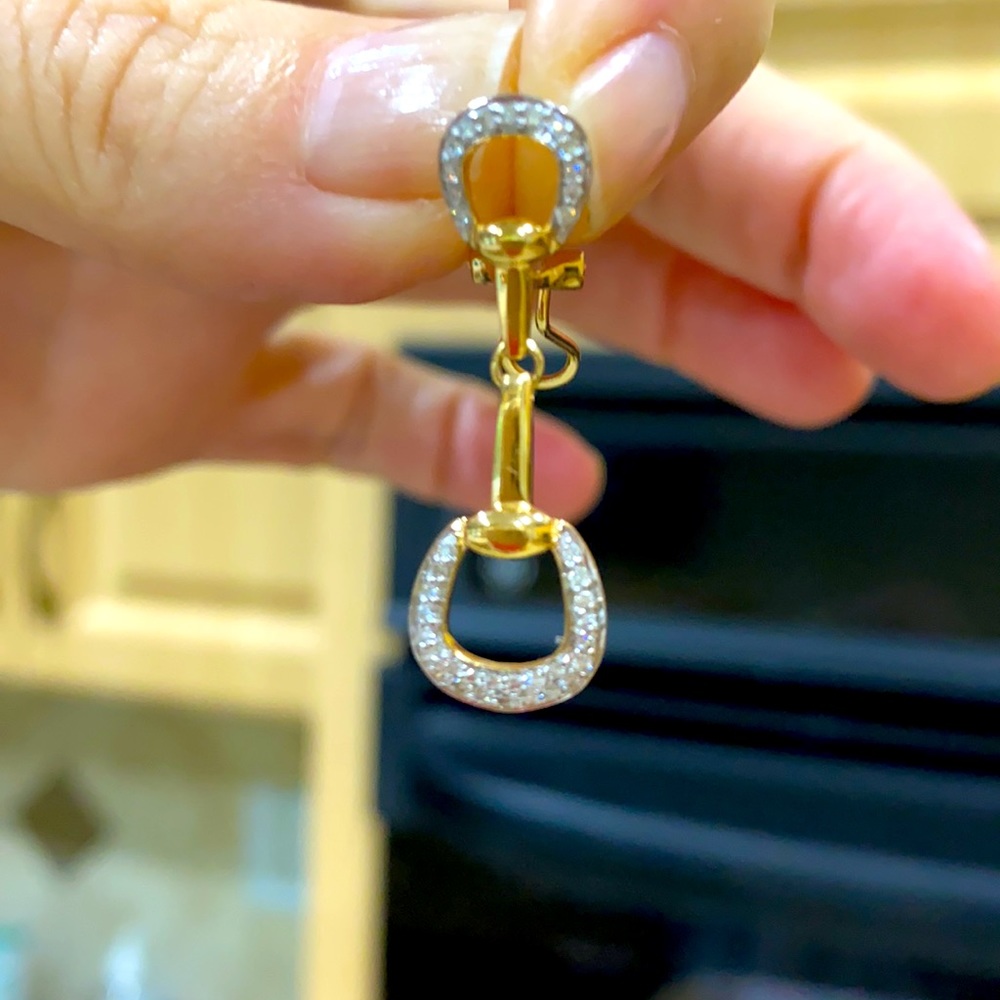 Equestrian horse bite earring made of 14k gold and accent diamonds